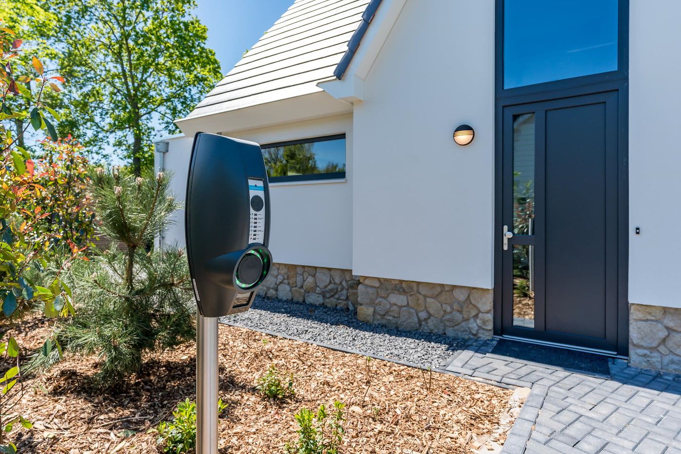 Blauwe Kiekendief vakantiehuis Den Burg Texel met groene omgeving en moderne uitstraling.