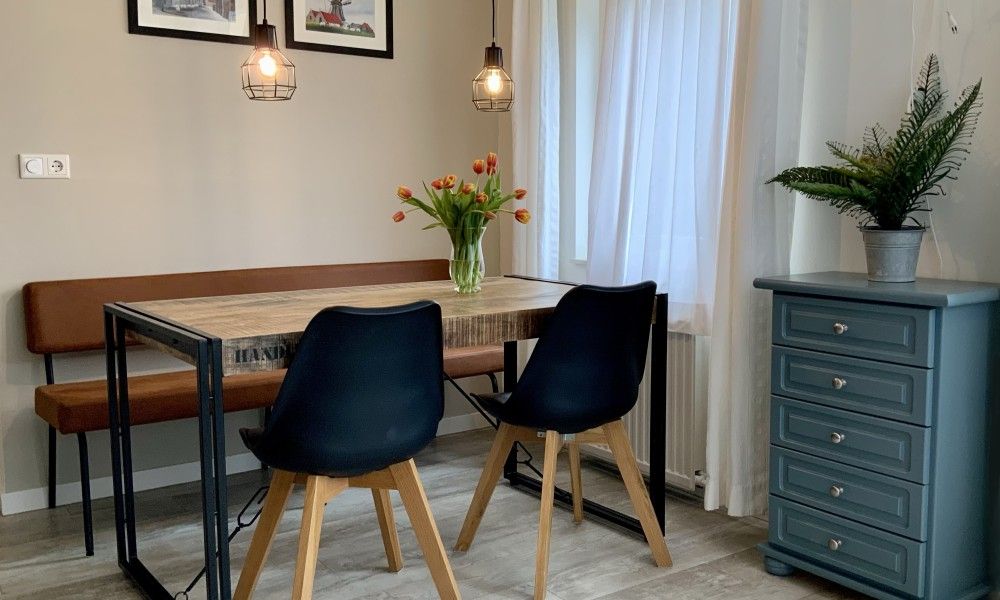 Attractive bedroom with two beds in family Smit vacation home, Den Burg, Texel, ideal for a good night's sleep.