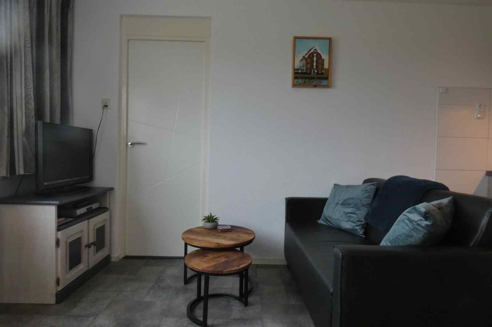 Gezellige woonkamer van NH198 vakantiehuis in Den Burg Texel.