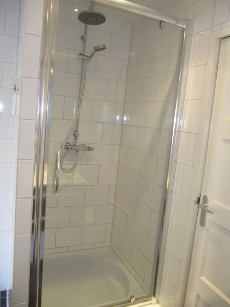 Modern shower in the bathroom of De Molen, vacation home in Den Burg, Texel.