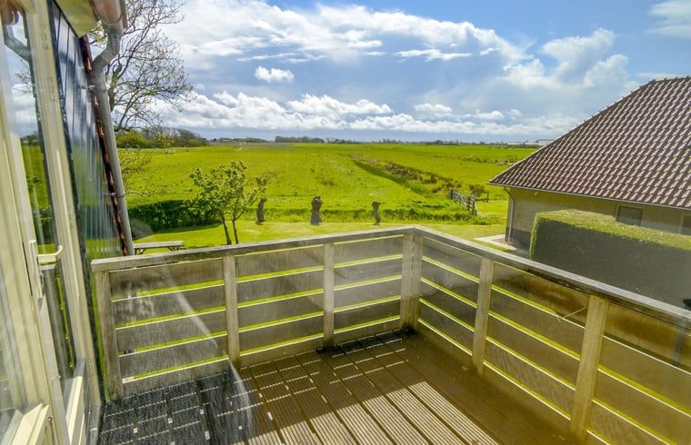 Uitzicht vanaf balkon in Vakantiehuis in Den Burg, Texel