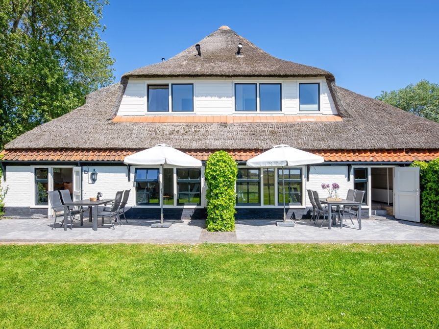 Wohnung Gouden Reaal 25 in Den Hoorn Texel mit grosser Veranda und Reetdach.