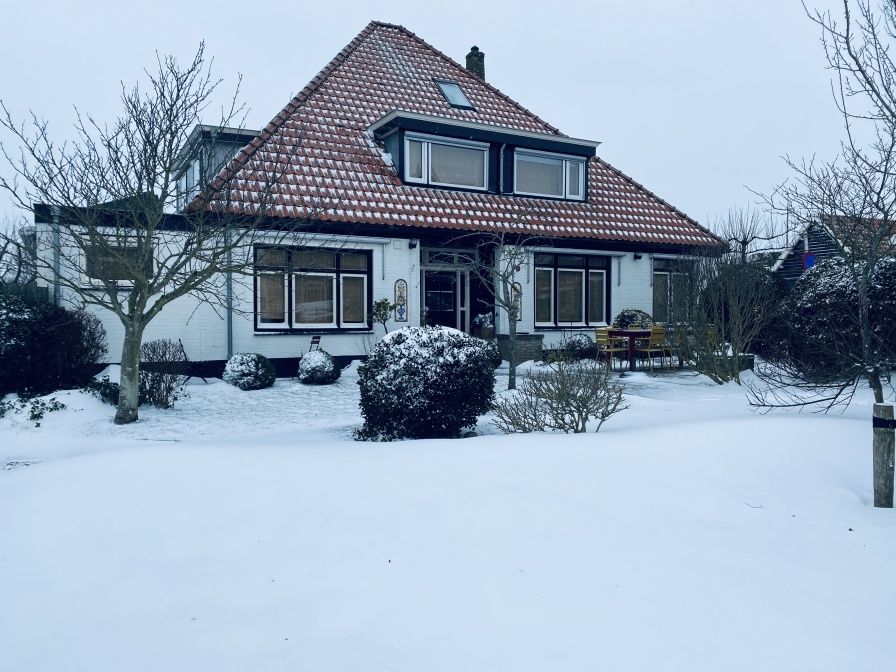Klif 1 Wohnung 1 in Den Hoorn Texel, Ferienhaus mit Blick auf die schneebedeckte Vorderseite, Watteninseln.