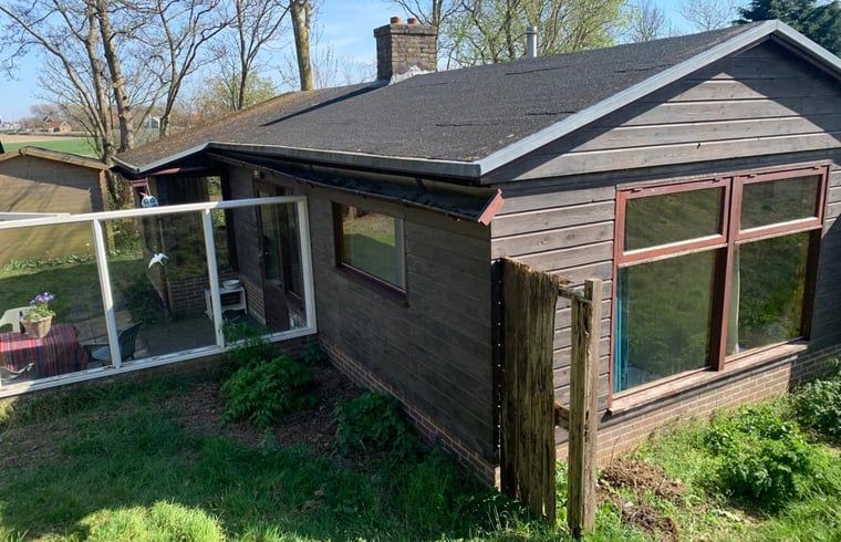 Exterior of Cottage in Den Hoorn, Texel, vacation home with conservatory.