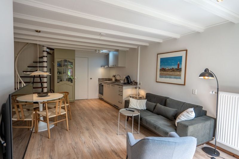 Stilvolles, modern eingerichtetes Wohnzimmer im Ferienhaus Ants Nest Den Hoorn Texel