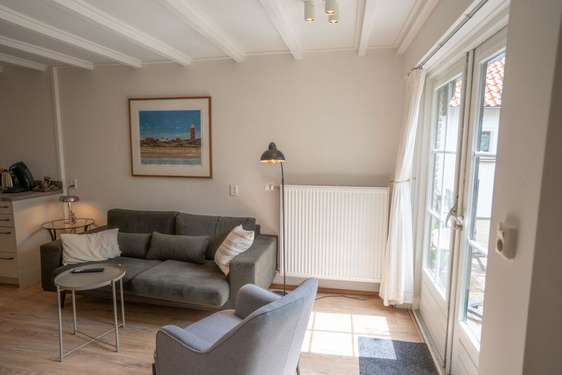 Gemuetliche Sitzecke im Ferienhaus Ants Nest Den Hoorn Texel mit Tageslicht