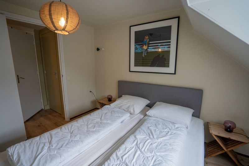 Schlafzimmer mit Kunstdekor im Ferienhaus Ants Nest Den Hoorn Texel
