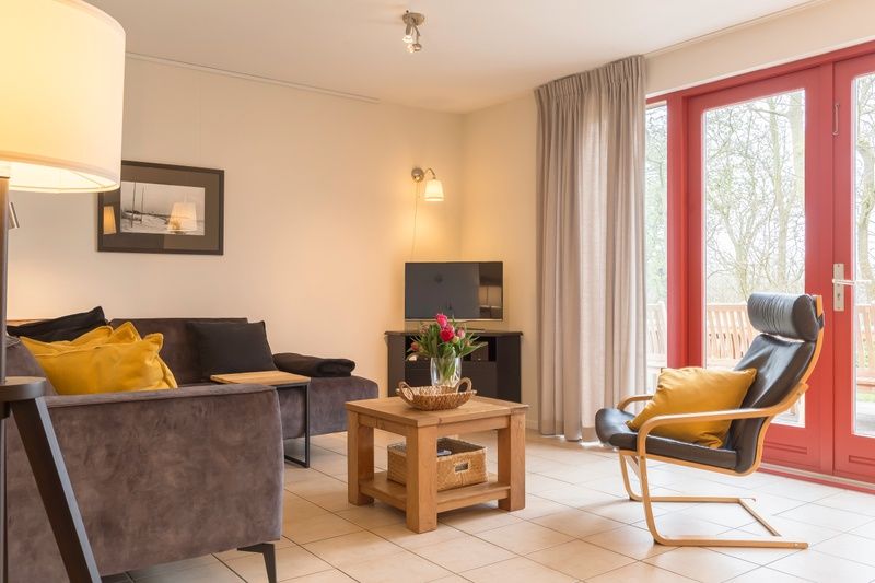 Cozy living room in Type I - No. 49 Kragenmaker, Oosterend Texel, vacation home with modern furnishings on the Wadden Islands.