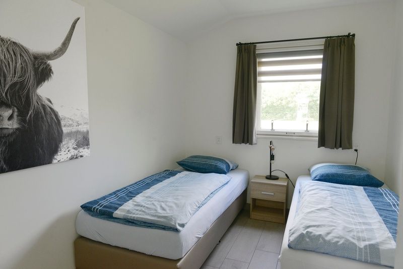 Modernes Schlafzimmer im Ferienhaus 3901 Farm Leiden, Sued-Eierland, Texel.