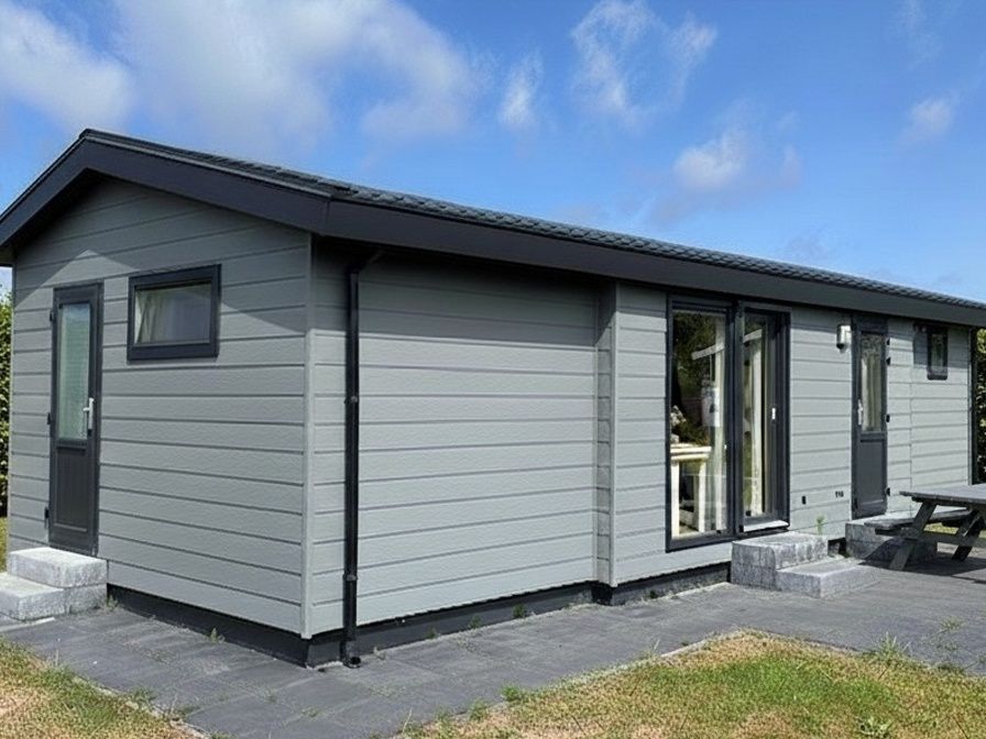Vakantiepark De Bremakker - Bosveld 137, modern vakantiehuis in De Dennen, Texel met ruime veranda en zonnige omgeving op de Waddeneilanden.