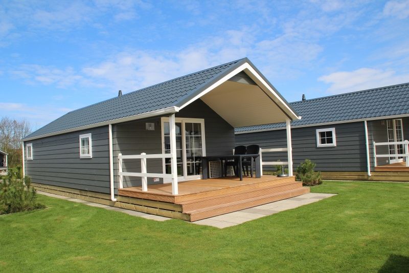 Veranda of Lodge - 6 persons in De Dennen, Texel, ideal for relaxation.