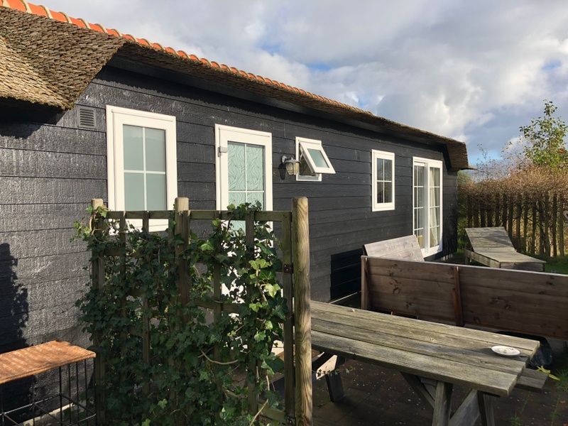 Vacation home at Holiday Park de Bremakker, Texel, with inviting outdoor space in De Dennen, ideal for an island stay.