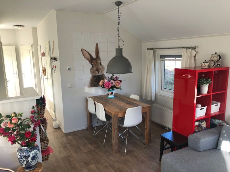 Dining area in Holiday Park de Bremakker, Texel, with cozy atmosphere in De Dennen, ideal for an island vacation.