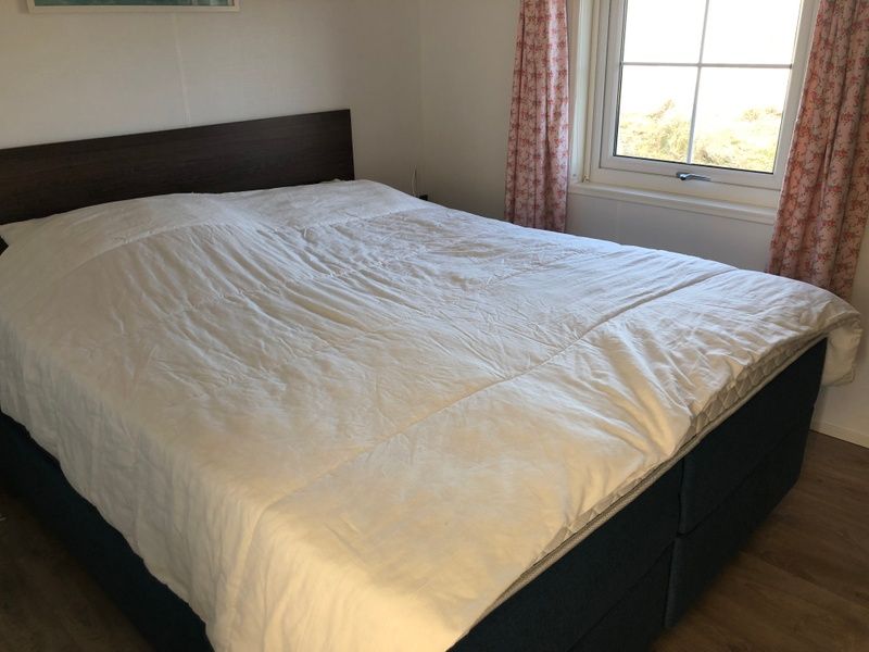 Spacious bedroom in Holiday Park de Bremakker, Texel. Comfort in De Dennen, ideal for a relaxing stay.