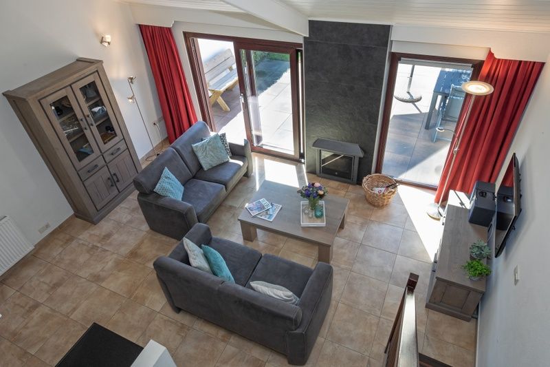 Cozy sitting area in Holiday home Gortersmient 270, De Dennen, Texel with modern furnishings.