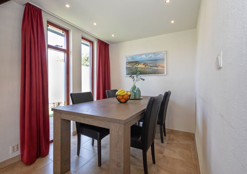 Bedroom with double bed in Holiday home Gortersmient 270, De Dennen, Texel for ultimate comfort.