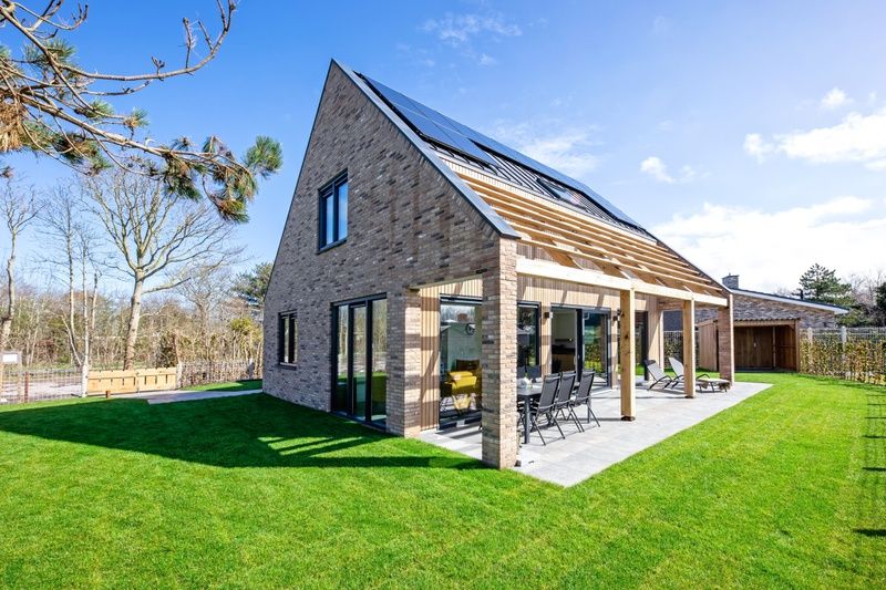Ferienhaus im Bungalowpark 't Luwe Land, Nieuw Vredelust in Texel mit grosser Veranda und natuerlicher Umgebung.
