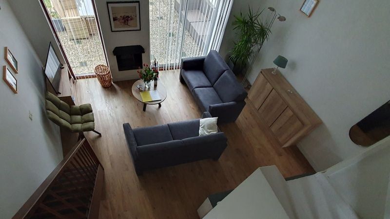 Gemuetliches Wohnzimmer von Bungalowpark Gortersmient, Ferienhaus Gortersmient 308 in De Dennen, Texel. Ein idealer Ort fuer Entspannung.