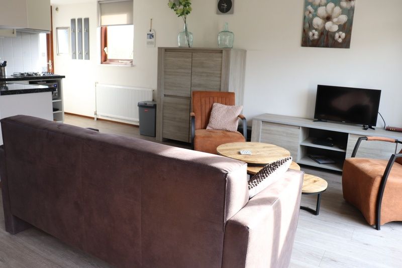 Gemuetliches Wohnzimmer im Ferienhaus Gortersmient 234, De Dennen, Texel, Waddeninseln.
