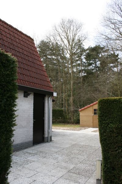 Rustige omgeving van Vakantiehuis Gortersmient 354 in De Dennen, Texel met omringende natuur.
