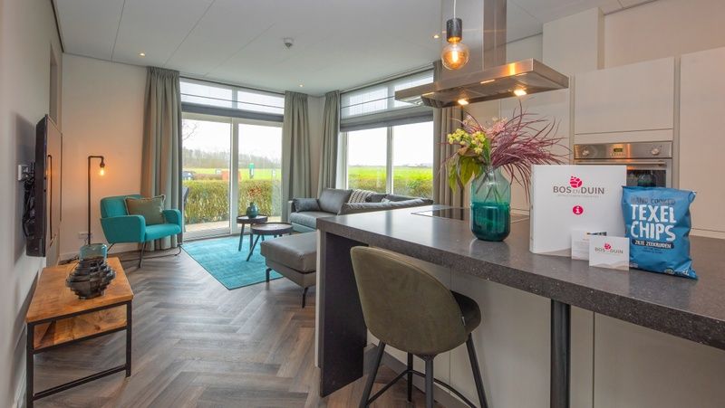 Moderne Kueche im Appartement Bos en Duin 01, De Dennen, Texel mit luxurioesen Annehmlichkeiten.