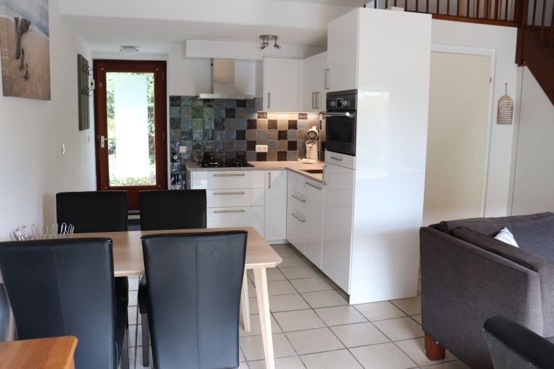 Spacious dining room in Holiday home Gortersmient 290, De Dennen, Texel.
