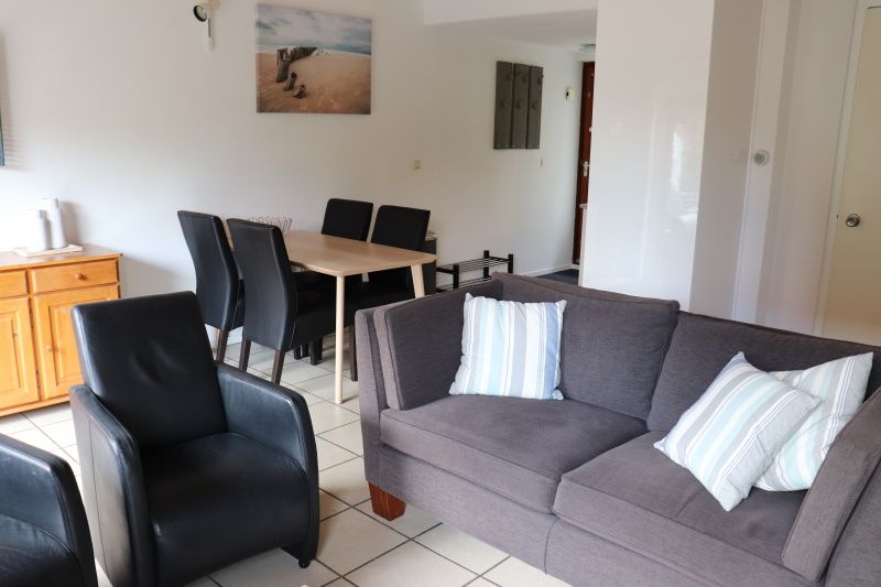 Cozy dining area in Holiday Home Gortersmient 290, De Dennen, Texel.