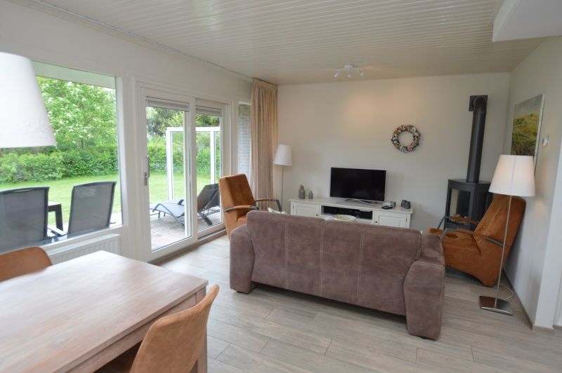 Gezellige woonkamer van Tempelierweg - Kogermient 11, vakantiehuis in De Dennen, Texel.