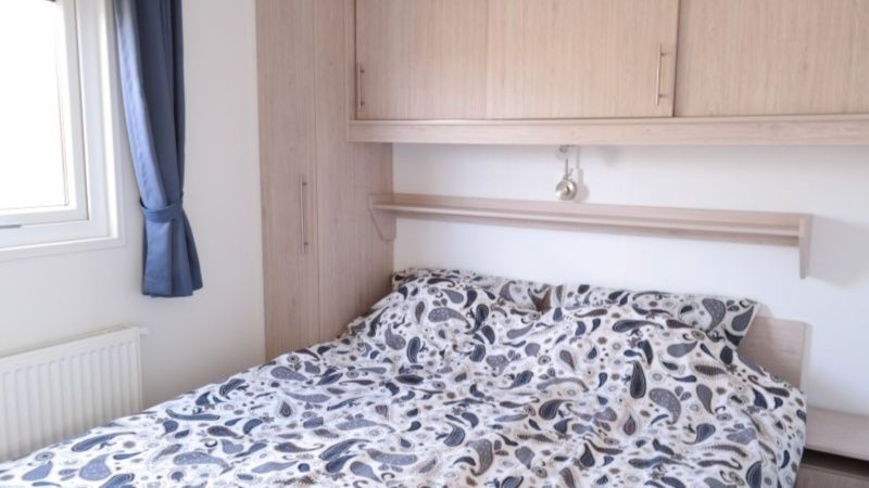 Attractive bedroom in Holiday Park de Bremakker vacation home in De Dennen Texel.