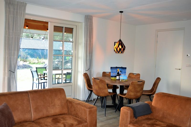 Dining room overlooking terrace in Golden Raand, De Dennen, Texel.
