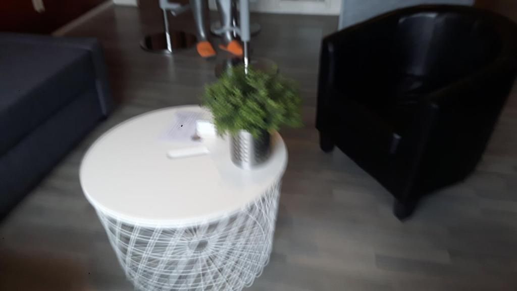 Cozy sitting area with plants in Apartment Amelander-Kaap TIME-OUT with SWIMMING POOL, Hollum, Ameland.