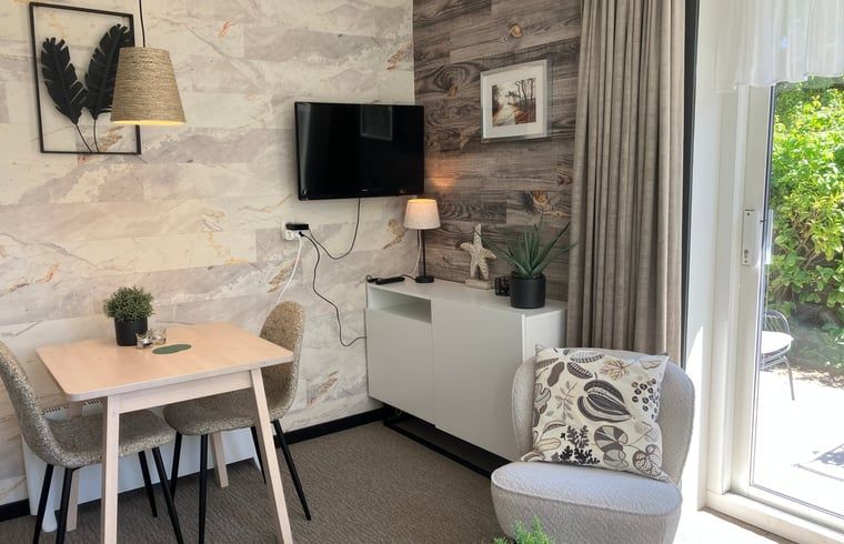 Gezellige binnenruimte van Huisje in Oosterend met moderne inrichting, Terschelling, Waddeneilanden.