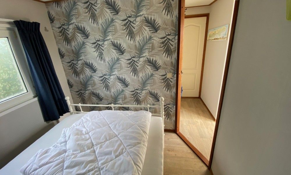 Sfeervolle slaapkamer in De Clochard nr 37, Midsland Noord, Terschelling.