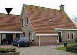 App. Beekema in Buren, Ameland, bietet ein charmantes Ferienhaus mit einer grossen Terrasse in laendlicher Umgebung auf den Watteninseln.