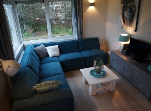 Cozy living room in EILANDLODGE 4, Hollum, Ameland. Comfortable sitting area with a view of the Wadden Islands.