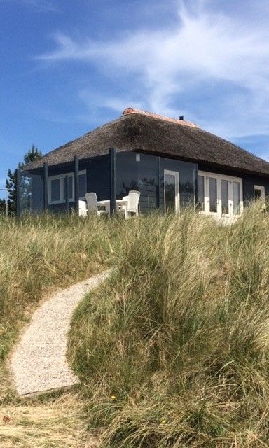 Charmantes Parnassia-Ferienhaus in den Duenen von Nes, Ameland, mit Panoramablick.
