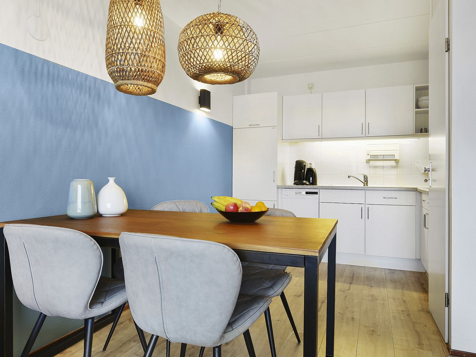 Stylish living room in Ameland State apartment, Nes, Ameland, with comfortable seating area.