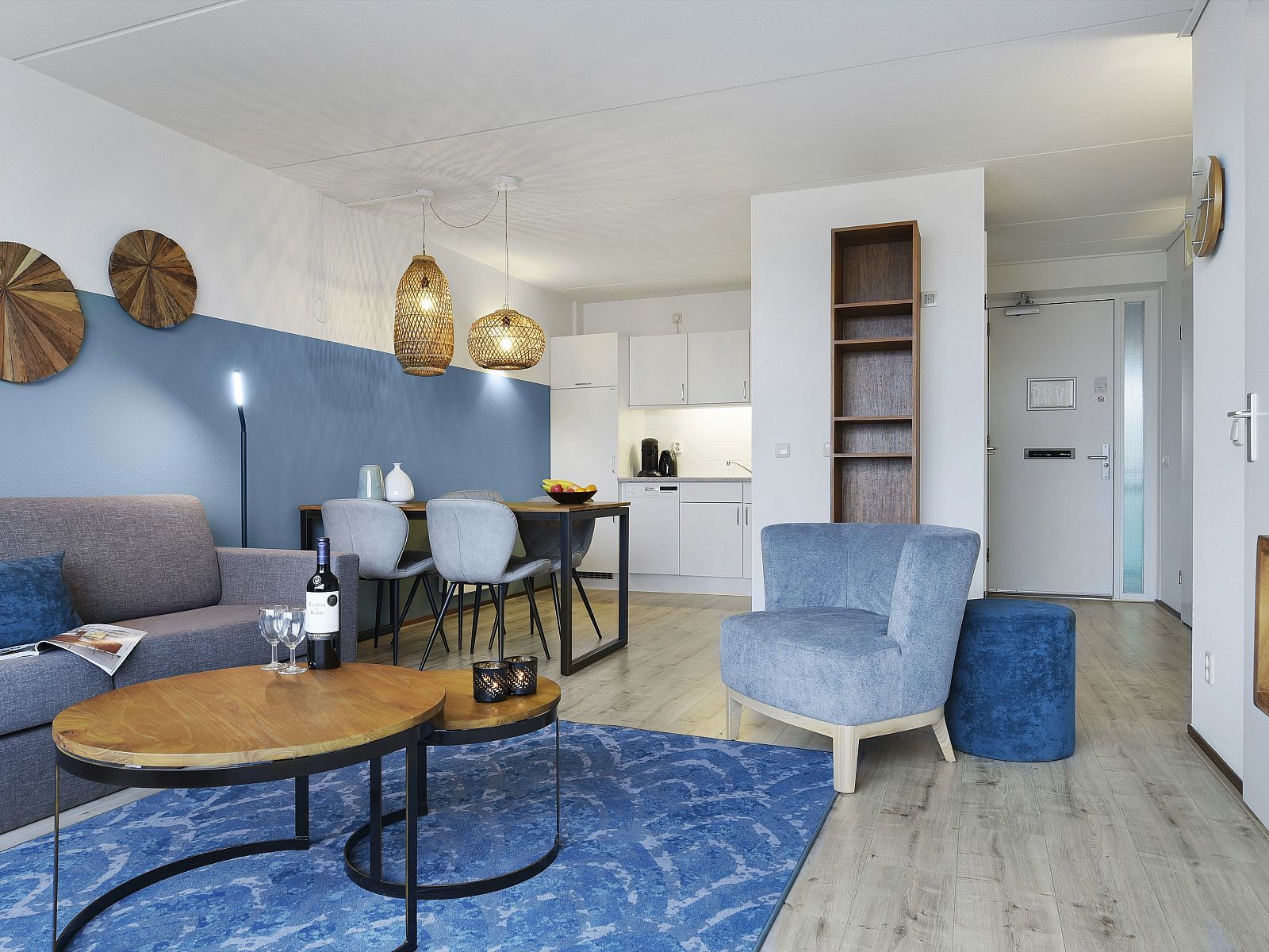 Detail of the cozy sitting area in Ameland State apartment, Nes, Ameland, with decorative elements.