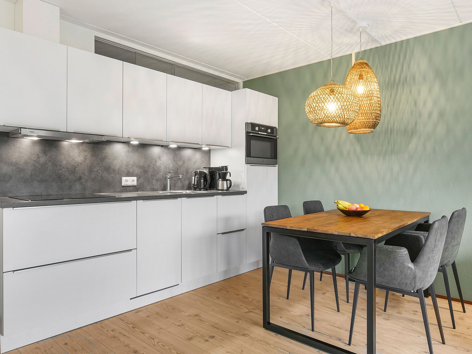 Covered dining table in Ameland State 4-person apartment in Nes, Ameland.