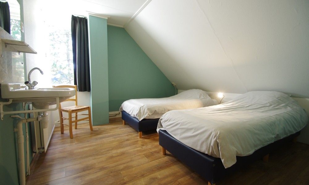 Double room in Louwtjesduin East vacation home on Schiermonnikoog.