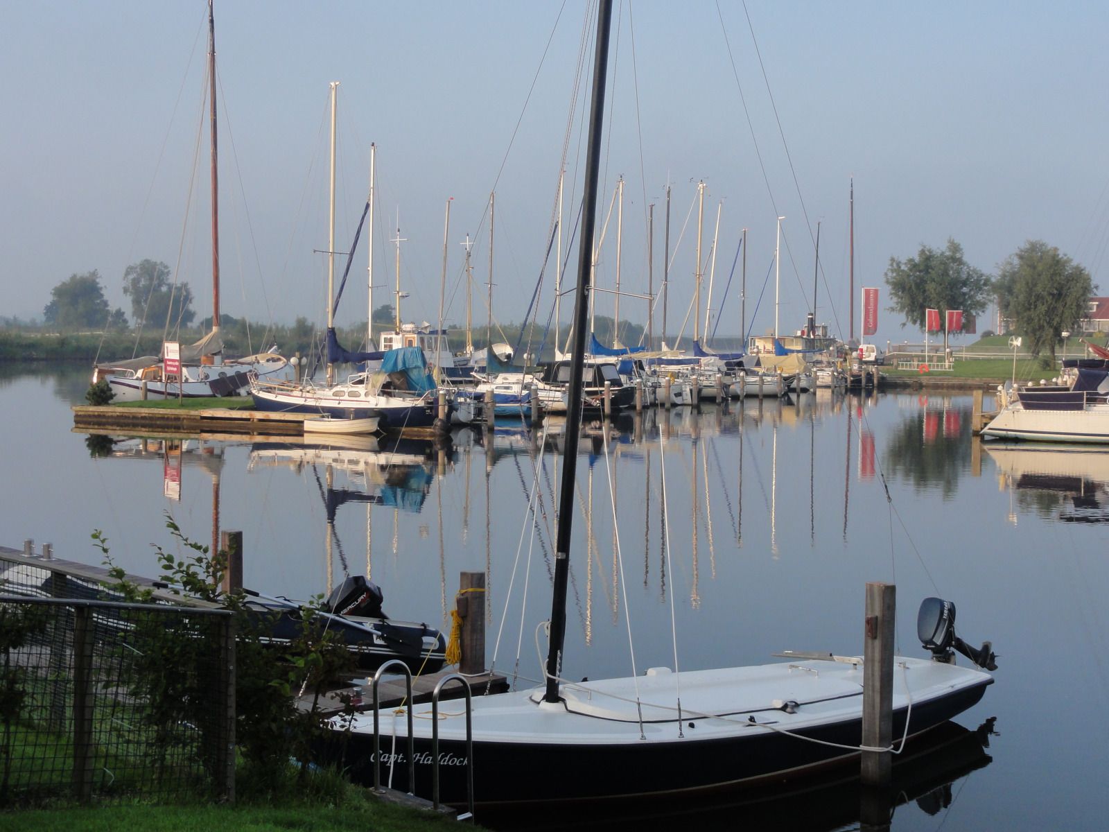 Kitchen and dining area in vacation home FR518, Koudum, with modern amenities.