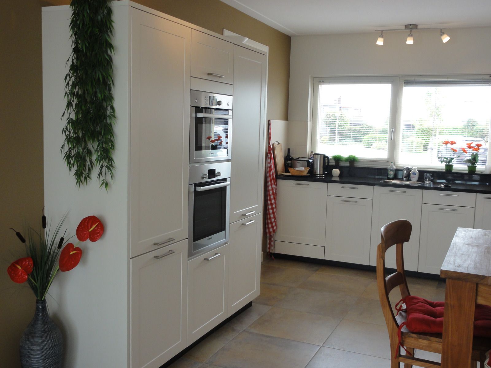 Spacious living room in vacation home FR518, Koudum, overlooking garden.