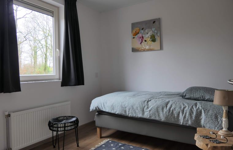 Knusse eenpersoonskamer in Vakantiehuis in Westerbork, perfect voor rust in Midden Drenthe, Drenthe.