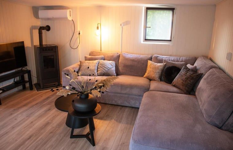 Gemuetliche Sitzecke im Cottage in Matsloot, Ferienhaus in Nord-Drenthe, ideal fuer Familientreffen und geselliges Beisammensein.