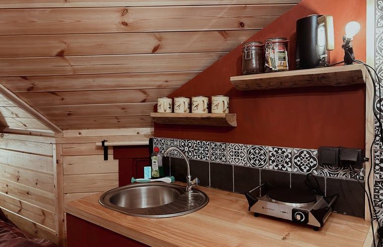 Compact kitchen in Cottage in Drouwenerveen, vacation accommodation in North Drenthe, Drenthe.