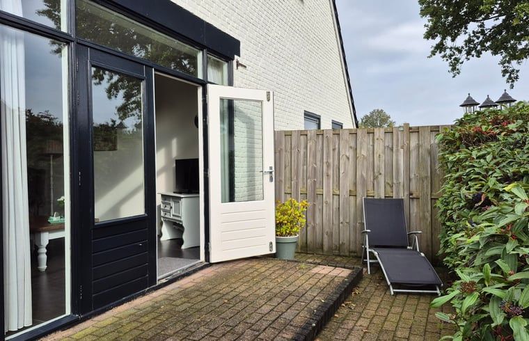 Relax on the terrace of Holiday Home in Dalerveen, Southeast Drenthe. Enjoy peace and privacy in this charming vacation rental.