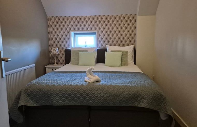 Gemuetliches Schlafzimmer im Ferienhaus in Dalerveen, Suedost-Drenthe, mit moderner Einrichtung und bequemen Betten fuer einen entspannten Aufenthalt.