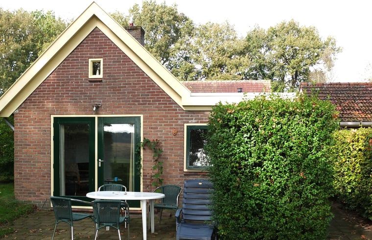 Huisje in Zuidwolde, vakantiehuis met terras in Zuidwest Drenthe omringd door groene natuur.