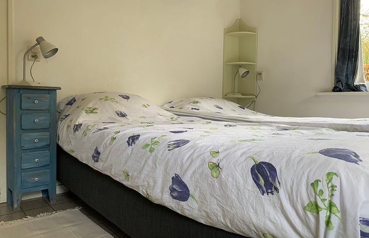 Knusse slaapkamer in Huisje in Zuidwolde, vakantiehuis in Zuidwolde met comfortabele bedden.
