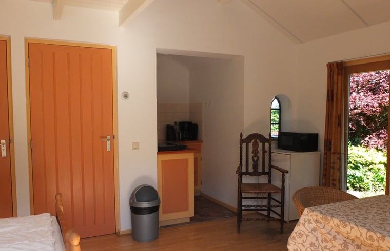 Gemuetlicher Innenbereich von Cottage in Zuidwolde, Ferienhaus mit Kochnische, Suedwest-Drenthe, Drenthe.